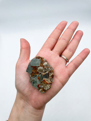 GREEN FLUORITE CLUSTER <br><small>THE GROUNDING STONE</small>