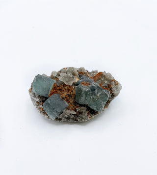 GREEN FLUORITE CLUSTER <br><small>THE GROUNDING STONE</small>
